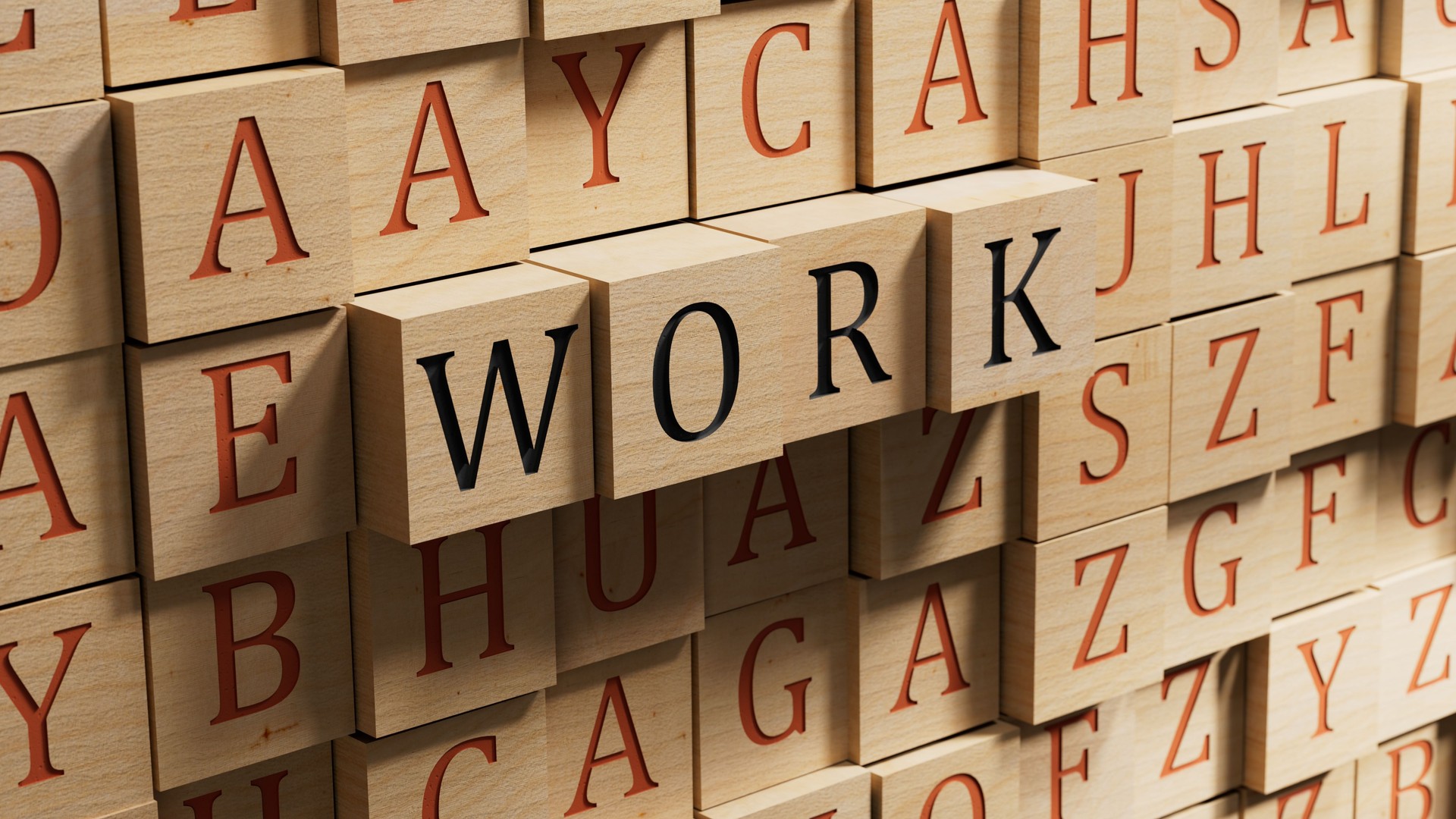 Word WORK. wooden blocks with letters isolated on a laptop keyboard.close up of wooden blocks,Business Concept.3D rendering on wooden background.